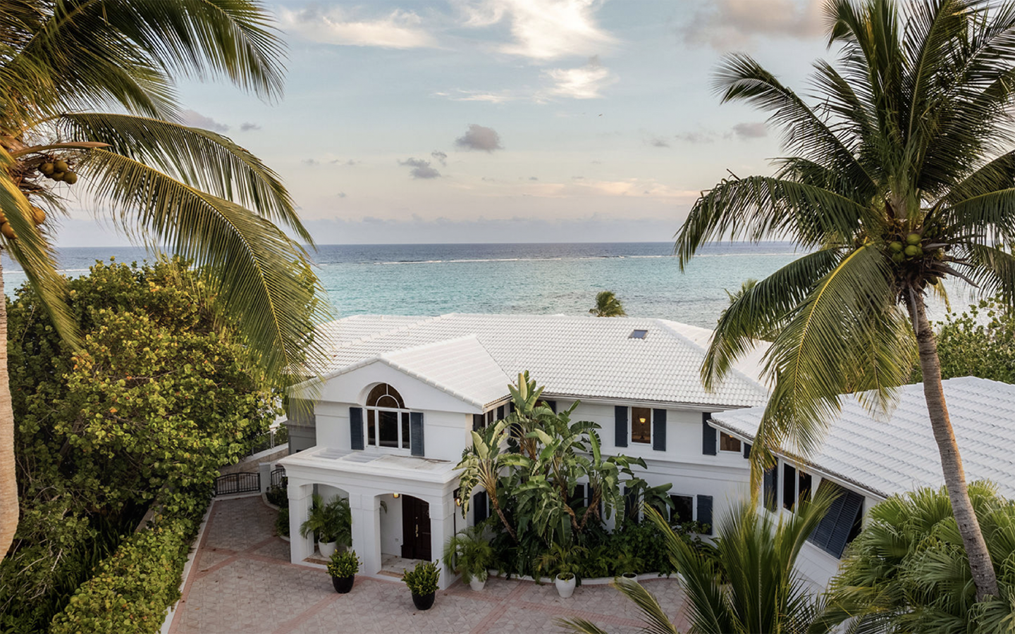 Beachfront villa on Grand Cayman at dusk